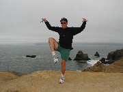 Monica acting weird on a rock
          above the Pacific