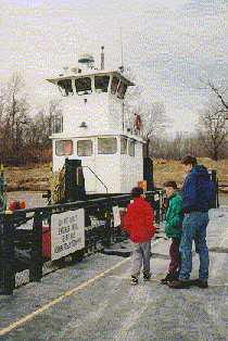 On the ferry, with the towboat in the background