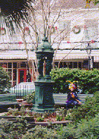 Duncan enjoying a French Quarter park (and sporting his balloon hat)