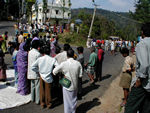 Demonstration.  In this small town on the road between Kodai and Kodai Road, two people were hurt by wild buffalos.  There is no nearby medical help.  To get attention, they blocked traffic for an hour or so.