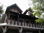 Another balcony - note the tree branches.  This was a cool, clean, cheap place