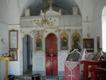 Inside of St. Andreas.  It follows the pattern of most of the churches around here.  The altar is behind the screen.  On the left is a little stand for candles and sometimes incense.  On the right (and hanging on the walls) is an icon. 