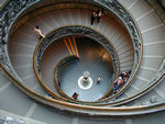 Stairway listing the names of the Popes, their dates of rule, and their coats of arms.