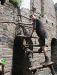 "Enterprising" fellows attempt to charge visitors for using "their" ladders.