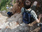 In this section, the wall was almost entirely gone, leaving the end of the wall as a cliff which is atop another cliff.  A local spends his days at the top of this section tending "his" ladder and a path around this section, charging people who wish a safer route.   He presumably spends his nights tearing up this section to make it worse.  (The Chinese may have too many people locked up, but this fellow is definitely one that they have foolishly overlooked.)  Every other place, the Chinese people were helpful; this guy nearly pushed Tote down a cliff.