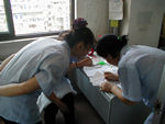 Three of the four people involved in figuring out our laundry