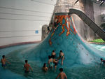 The kids scaling an ersatz volcanoe