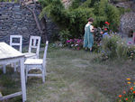 Maggie playing a make-believe game in the garden