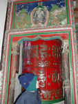 Maggie with a giant prayer wheel.  After giving it a spin, she was surprised to hear it ding, dong.