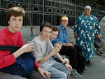 Having tea in a shady spot on the side of the street.  Tea vendors work the street.  When you are done, you just leave the glass.