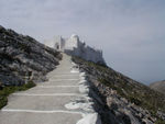 Looking up at the monastery from the little church