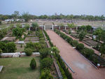 Our hotel's main selling point was a large garden.  It was too hot to use, except in the morning, but in the morning it was great.  We also liked looking out at what was happening on the other side of the fence.  Today is market day.