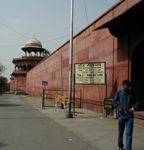 Entrance to the Taj Mahal and cow and dome