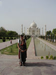 Cute girls with Taj.  The Taj Mahal is considered the finest example of Mughal architecture, a blending of Indian, Persian, and Islamic styles.   It is unbelievable.  