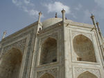 The mausoleum has four nearly identical facades, each with a 108 foot central arch and slanted corners incorporating smaller arches. 