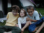 Maggie, Ellie, and Gus smiling for the photo